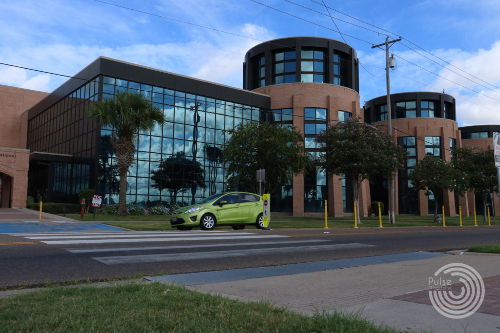 A green car passes by the University Recreation building complex on Aug. 17, 2021 at the UTRGV Edinburg campus. Photos by: Priscylla Guzman