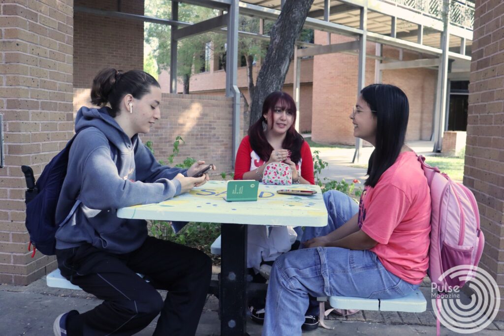 (Left to right) Computer engineering freshmen Enrique Guerra, biomedical science freshmen Giselle Carrizales and Ana Sanchez have a conversation on Edinburg campus Nov. 6. Mikaela Lagunes/ Pulse. 
