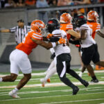 Vaqueros bleed orange