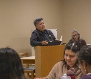 Writer Raquel Gutiérrez reads “Brown Neon” and explains their writing at the “Borderlands Poetics Workshop & Reading” April 7 at the UTRGV Library on the Edinburg campus. Logan Huizar/Pulse